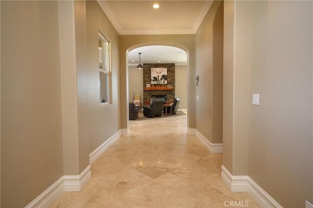 hallway featuring crown molding