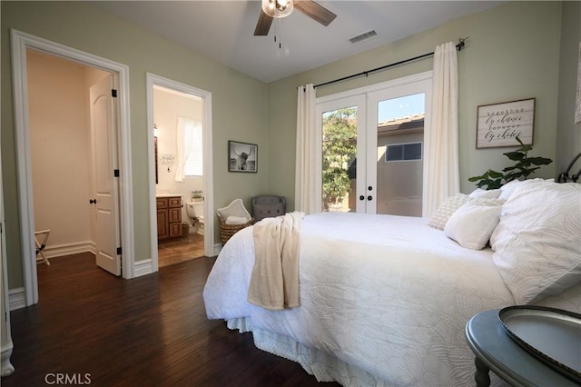 bedroom with access to outside, french doors, ensuite bathroom, ceiling fan, and dark hardwood / wood-style floors