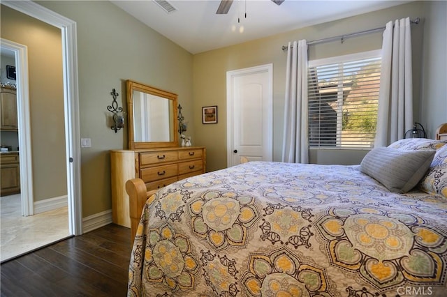 bedroom featuring ceiling fan and dark wood-type flooring