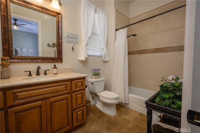 full bathroom featuring vanity, toilet, ceiling fan, and shower / bath combo with shower curtain