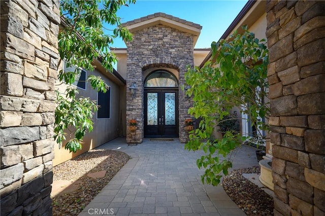 doorway to property with french doors