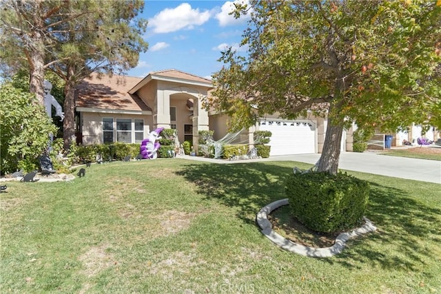 view of front facade featuring a garage and a front lawn