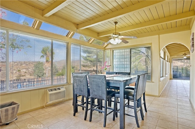 sunroom / solarium with ceiling fan, wooden ceiling, vaulted ceiling with beams, and a wall mounted air conditioner