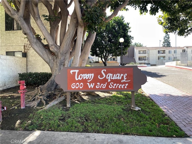 view of community sign