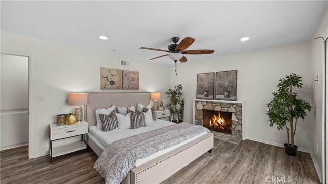 15757 Creswick Dr, La Mirada, CA 90638 - bedroom featuring wood finished floors, a fireplace, recessed lighting, baseboards, and ceiling fan