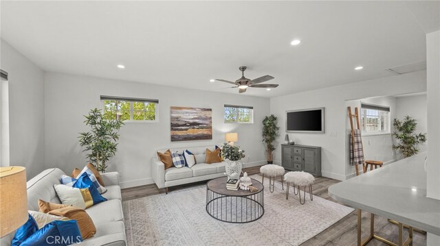15757 Creswick Dr, La Mirada, CA 90638 - living area featuring plenty of natural light, wood finished floors, recessed lighting, and baseboards