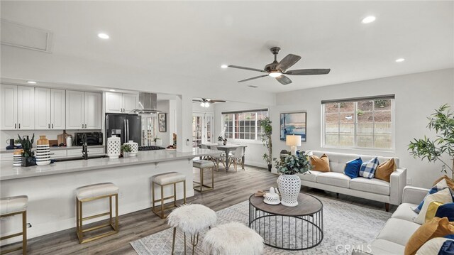 15757 Creswick Dr, La Mirada, CA 90638 - living room with ceiling fan, recessed lighting, wood finished floors, and baseboards