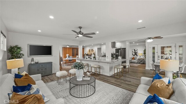 15757 Creswick Dr, La Mirada, CA 90638 - living area featuring ceiling fan, recessed lighting, light wood-style floors, french doors, and baseboards