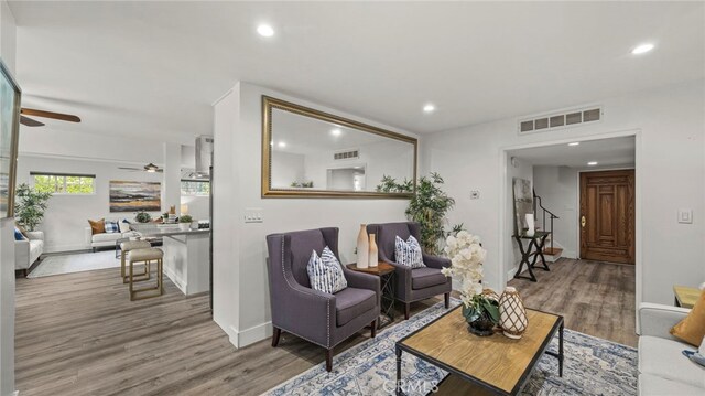 15757 Creswick Dr, La Mirada, CA 90638 - living room with ceiling fan, wood finished floors, recessed lighting, and baseboards