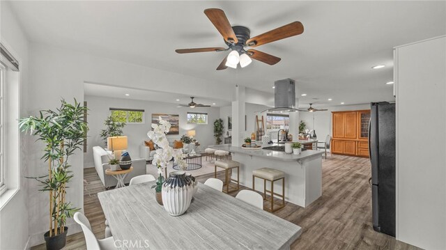 15757 Creswick Dr, La Mirada, CA 90638 - dining area featuring a ceiling fan, recessed lighting, and wood finished floors