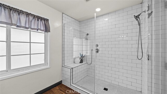 15757 Creswick Dr, La Mirada, CA 90638 - bathroom with a stall shower, wood finished floors, baseboards, and recessed lighting