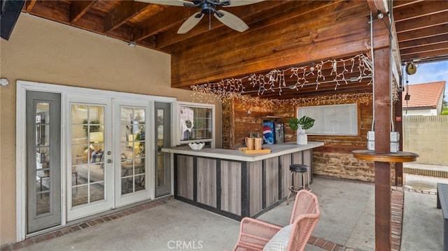 view of patio / terrace with ceiling fan and french doors