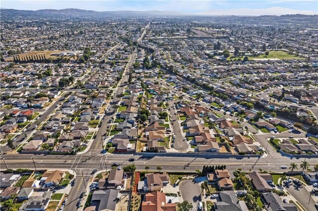 15757 Creswick Dr, La Mirada, CA 90638 - aerial view of property and surrounding area featuring nearby suburban area and a mountain backdrop