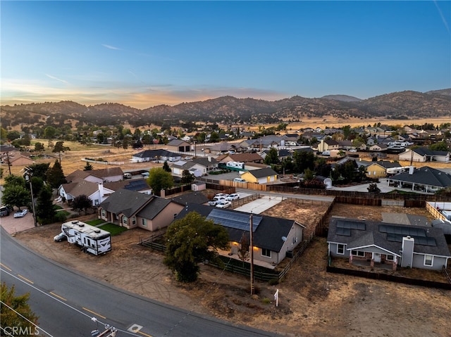 aerial view at dusk with a mountain view