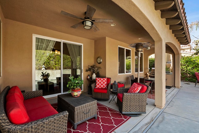 view of patio with ceiling fan and an outdoor hangout area