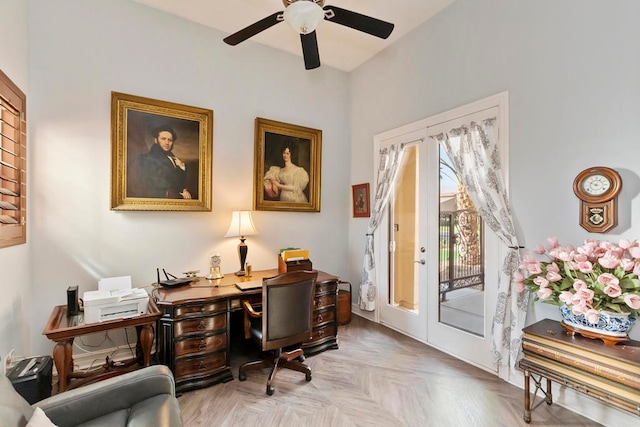 office with ceiling fan, french doors, and light parquet flooring