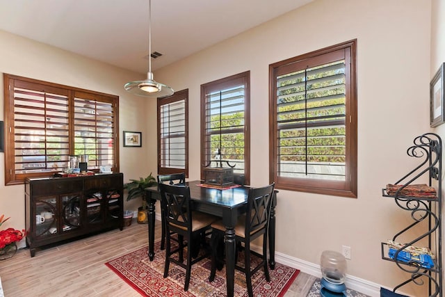 dining room featuring light hardwood / wood-style floors