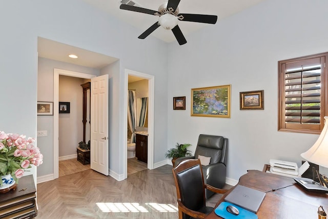 office space featuring light parquet flooring and ceiling fan