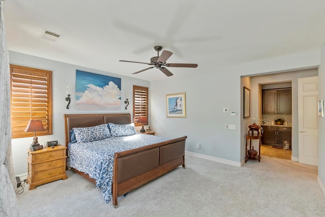 bedroom with light colored carpet and ceiling fan