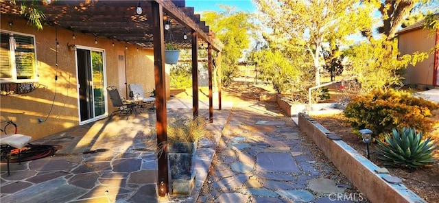 view of patio featuring a pergola