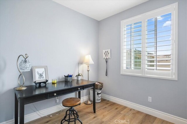 home office featuring light hardwood / wood-style floors