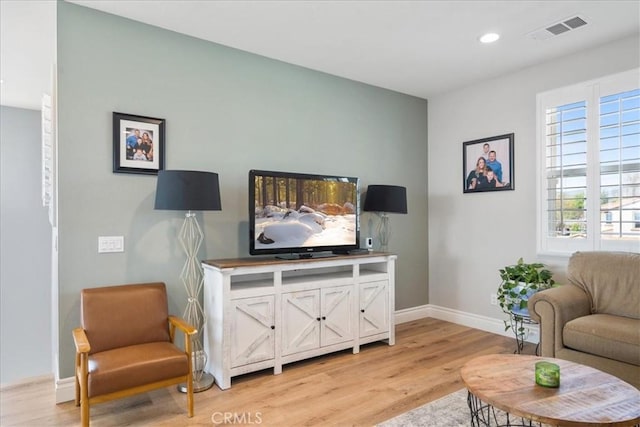 living room featuring light hardwood / wood-style flooring