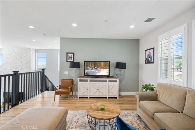 living room featuring light wood-type flooring