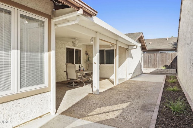 view of patio / terrace featuring ceiling fan