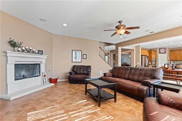 living room featuring ceiling fan