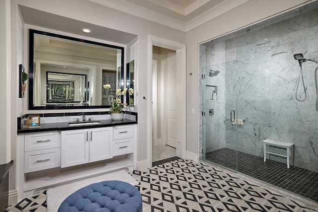 bathroom with vanity, a shower with shower door, tile patterned floors, and tasteful backsplash