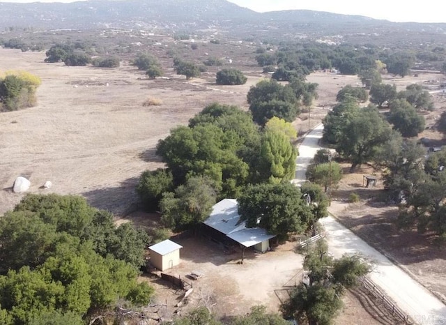 aerial view featuring a mountain view and a rural view