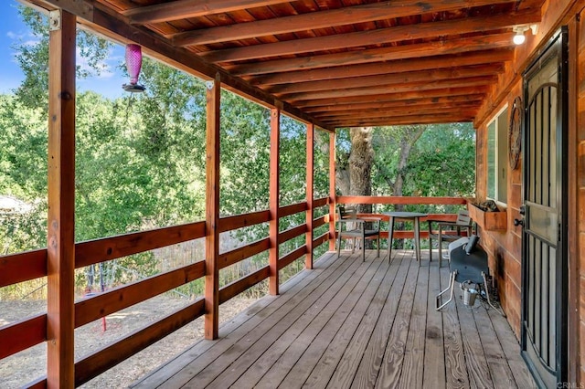 wooden deck with area for grilling