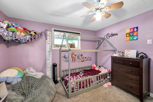 bedroom with light colored carpet and ceiling fan