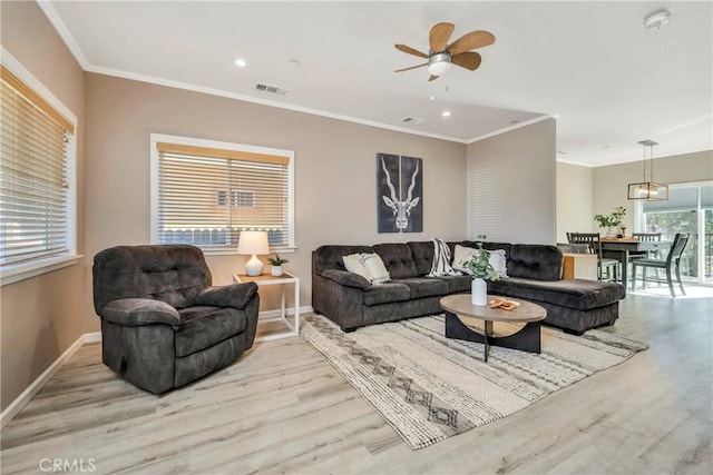 15425 Graham St, Middletown, CA 95461 - living area featuring visible vents, ceiling fan, wood finished floors, and baseboards