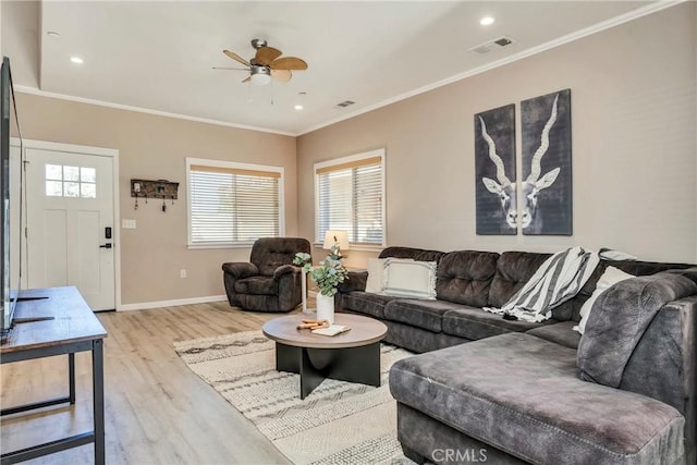 15425 Graham St, Middletown, CA 95461 - living room featuring a ceiling fan, visible vents, light wood-style floors, and a healthy amount of sunlight