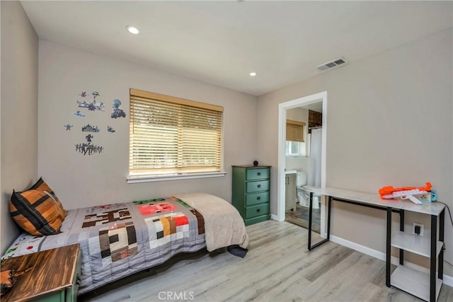 15425 Graham St, Middletown, CA 95461 - bedroom featuring ensuite bathroom, light wood-type flooring, visible vents, recessed lighting, and baseboards