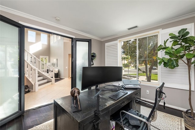 office space with ornamental molding and hardwood / wood-style floors