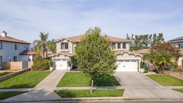 view of front facade featuring a front lawn and a garage