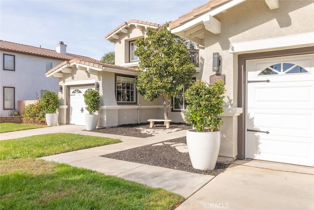 mediterranean / spanish-style house featuring a garage