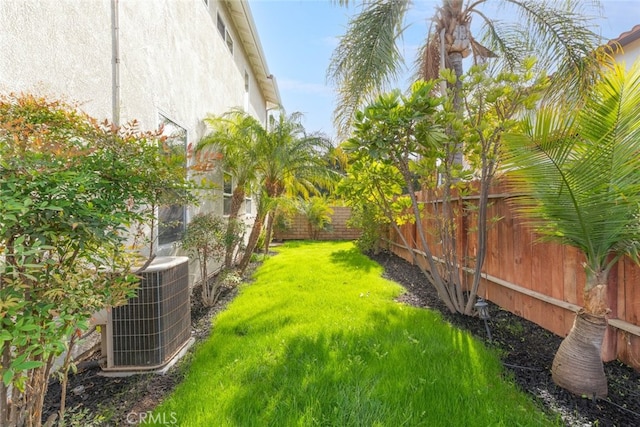 view of yard with central air condition unit