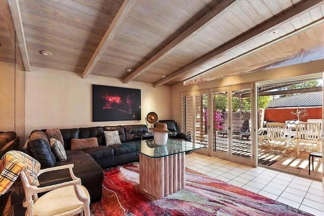 living room with beamed ceiling, tile patterned floors, and wood ceiling