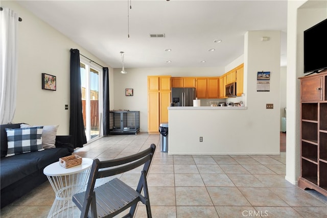 living room with light tile patterned flooring