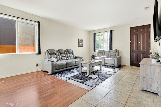 living room with light hardwood / wood-style floors