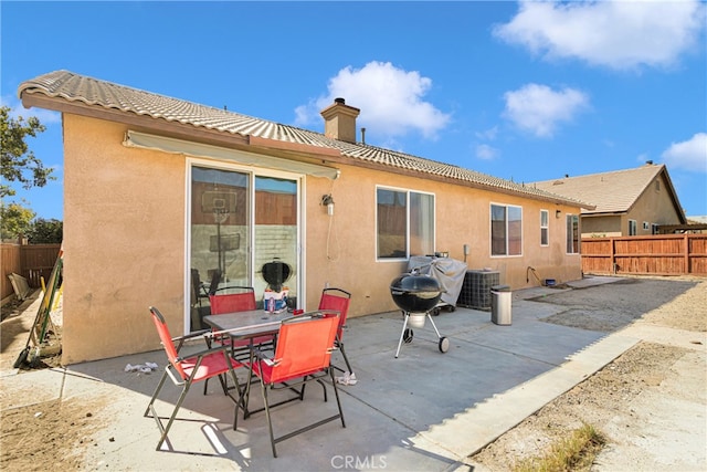 rear view of house featuring a patio