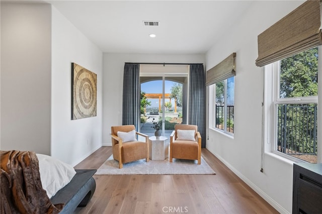 living area featuring light hardwood / wood-style floors