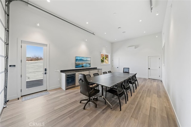 dining space with light wood-type flooring