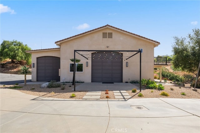 view of front of home featuring a garage