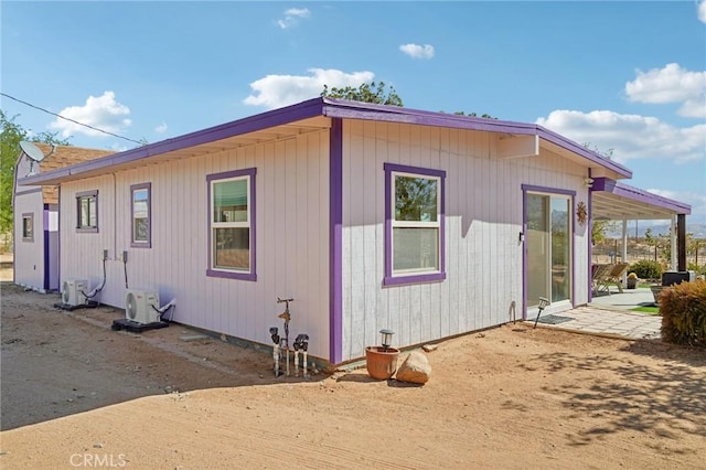 view of property exterior featuring ac unit