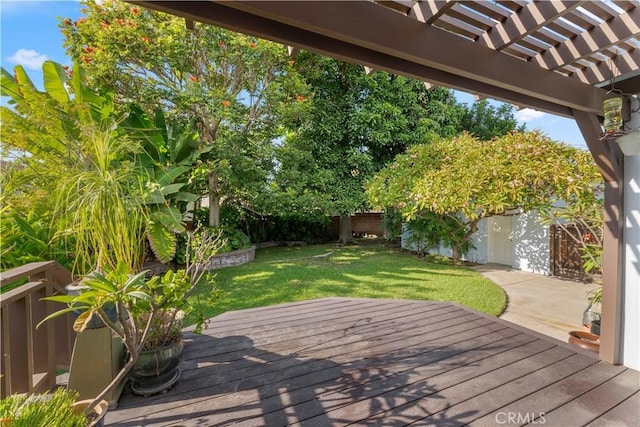 wooden deck with a pergola and a yard