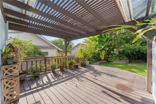 wooden deck with a pergola and a yard